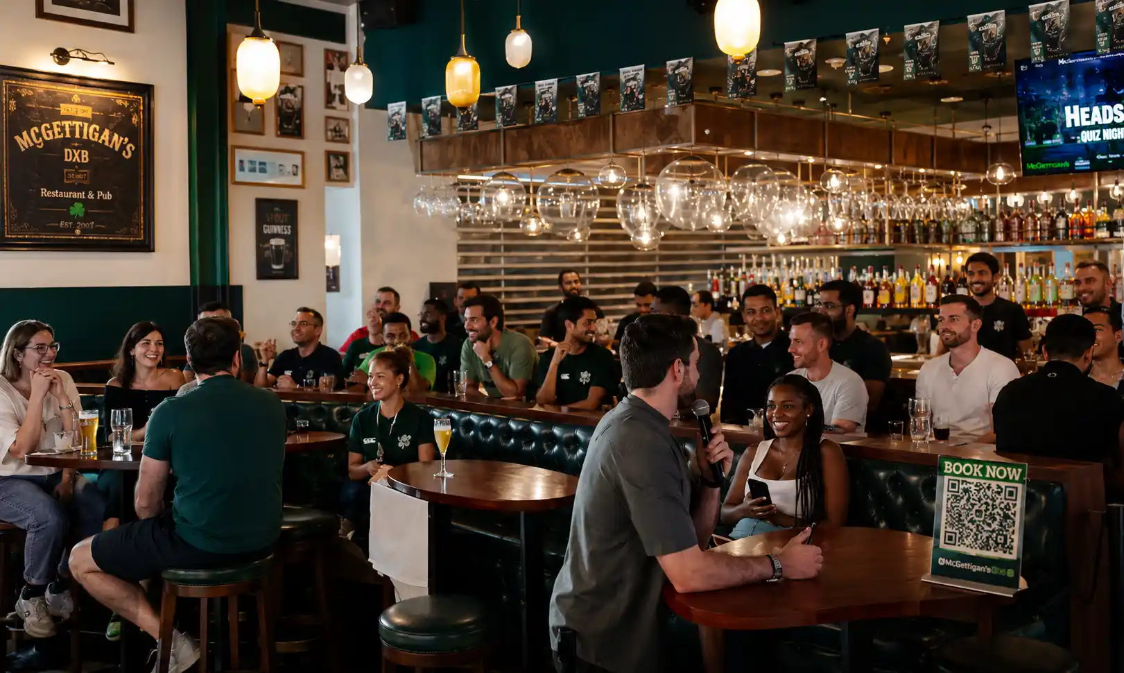 Professional quiz master hosting an engaging corporate quiz night at a Dubai pub, with teams participating, laughing, and interacting in a lively team-building atmosphere.
